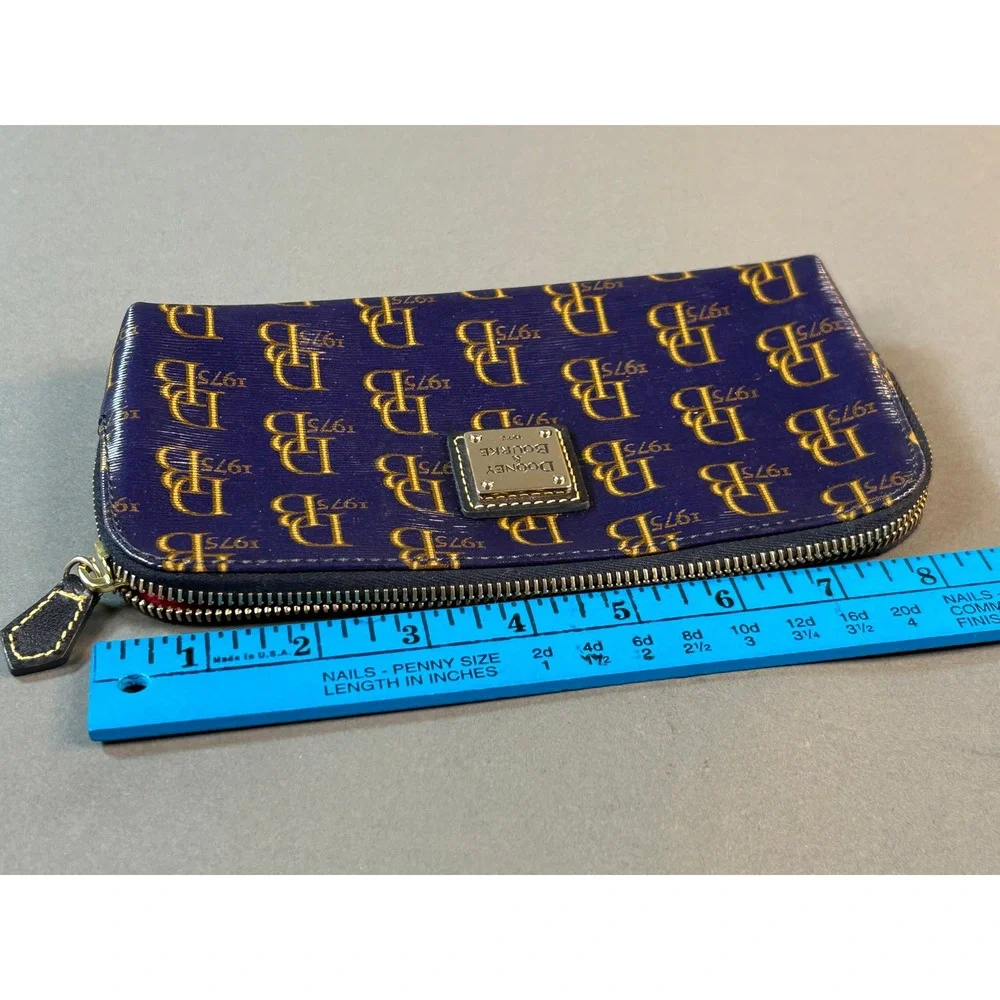 Dooney & Bourke Navy Blue Gold Monogram 1975 Coated Canvas Cosmetic Makeup Bag